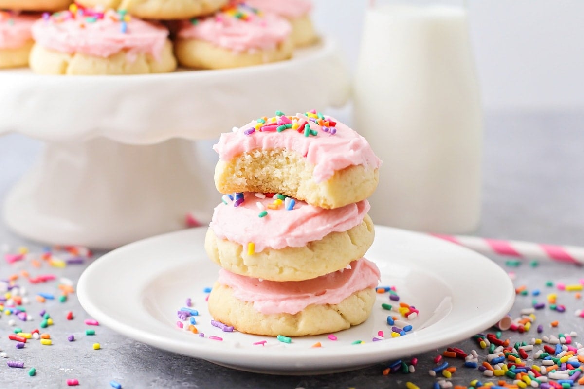 Drop cookies stacked on plate.